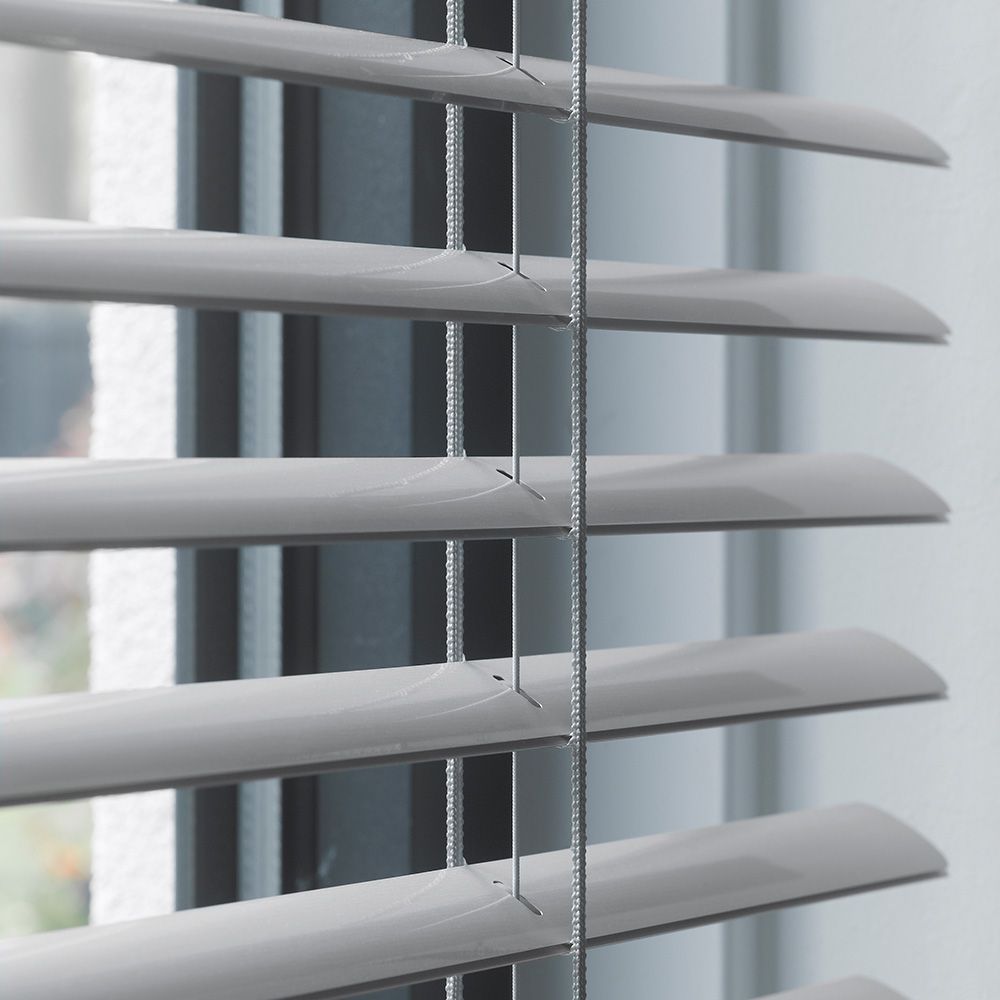 Close-up of venetian blind slats and cords